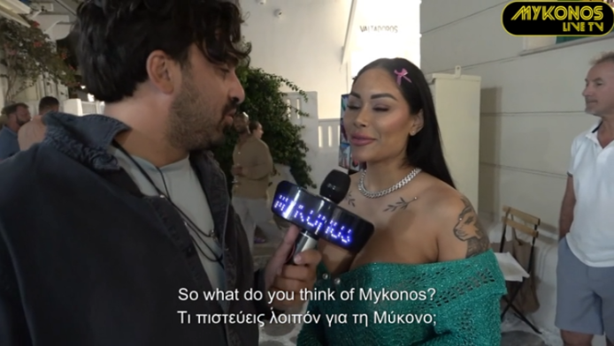 Έκανε δηλώσεις στο «Mykonos TV», αλλά όλοι κοιτούσαν το ανοιχτό φόρεμα (Vd)